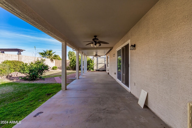 view of patio / terrace featuring ceiling fan