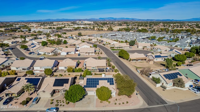 birds eye view of property with a mountain view