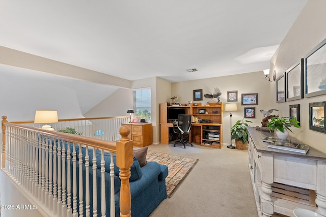 home office with visible vents and carpet floors