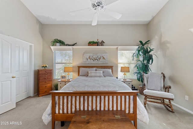 bedroom with carpet floors, a ceiling fan, and baseboards