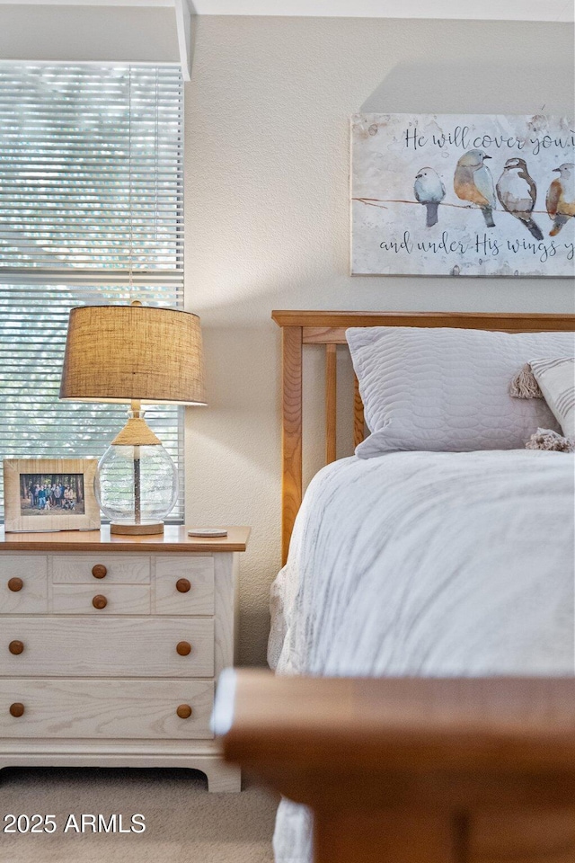 bedroom with a textured wall
