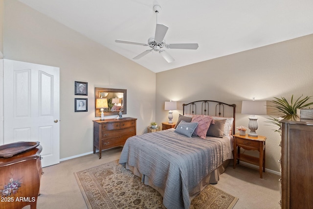 bedroom featuring baseboards, a ceiling fan, lofted ceiling, and light carpet