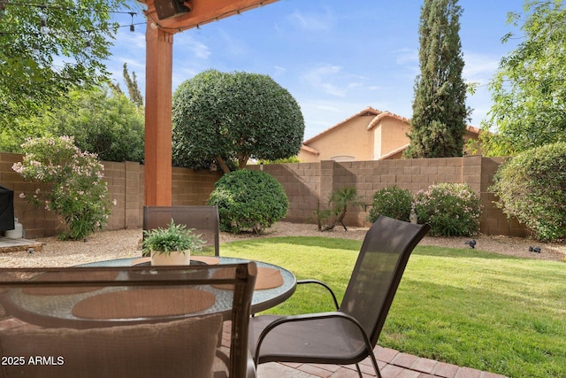 view of patio / terrace featuring fence