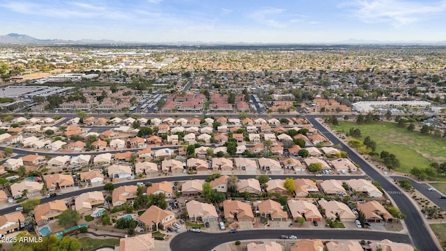 bird's eye view featuring a residential view and a mountain view