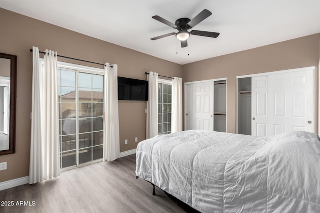 bedroom with ceiling fan and hardwood / wood-style floors