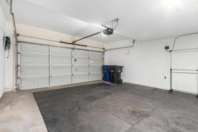 garage featuring a garage door opener