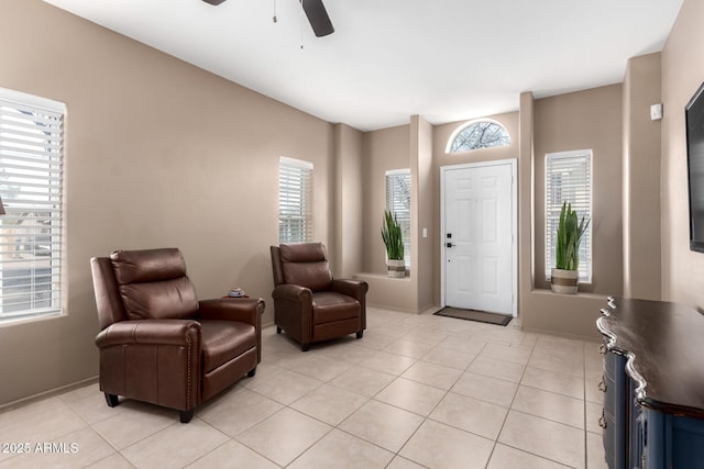 interior space featuring ceiling fan