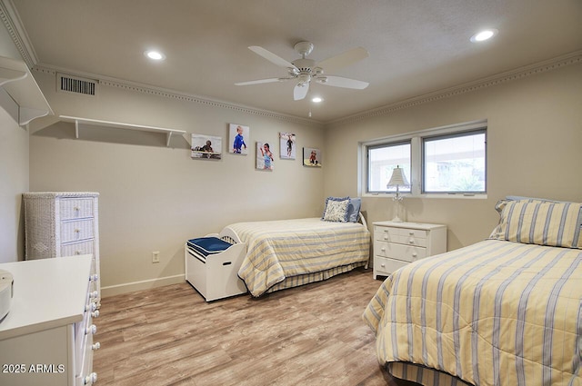 bedroom with light wood-style flooring, recessed lighting, visible vents, baseboards, and ornamental molding