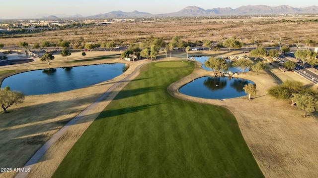 view of pool featuring a water and mountain view