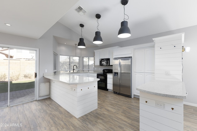 kitchen with kitchen peninsula, light wood-type flooring, black appliances, white cabinetry, and lofted ceiling