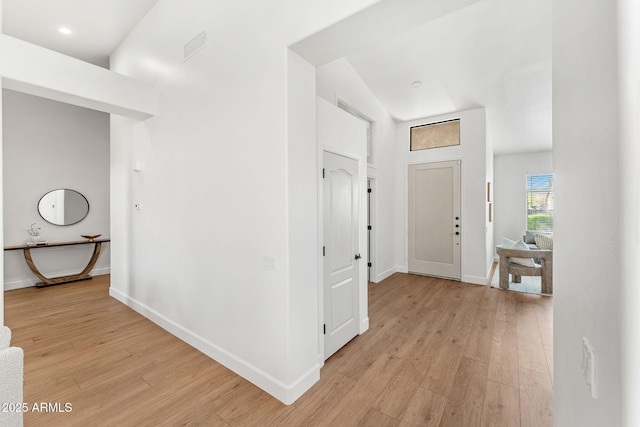 hallway featuring light hardwood / wood-style floors