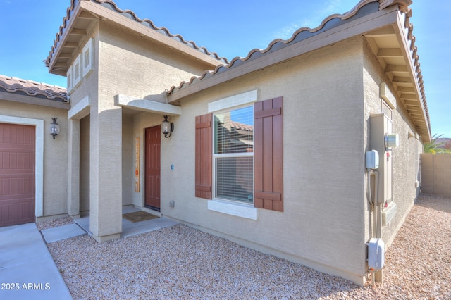 property entrance with a garage