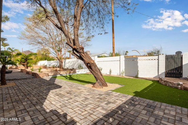 view of patio featuring a fenced backyard