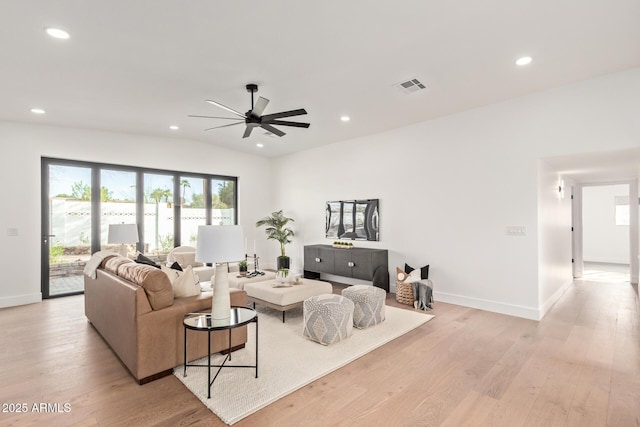 living area featuring light wood-type flooring, visible vents, recessed lighting, and a ceiling fan