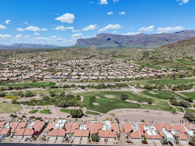 aerial view with view of golf course, a residential view, and a mountain view