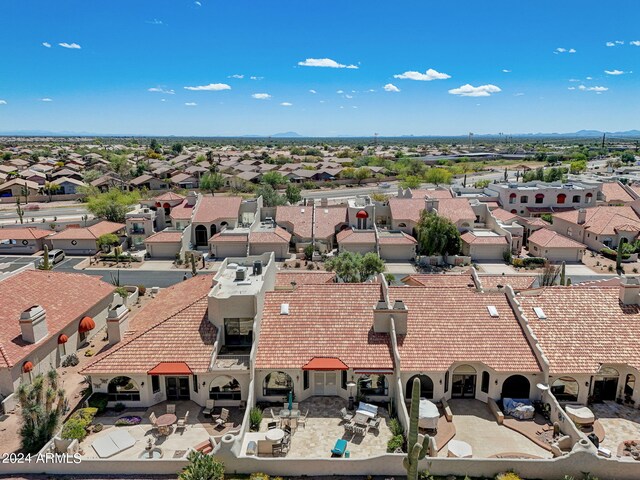birds eye view of property with a residential view