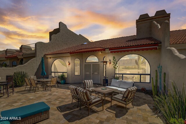 view of patio featuring outdoor lounge area and outdoor dining space