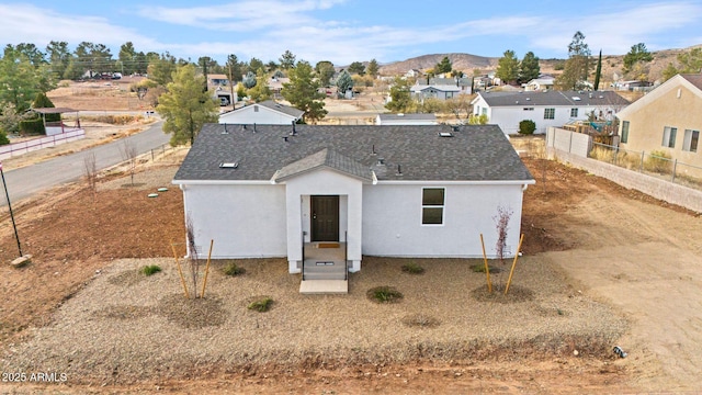 view of front of home featuring a mountain view