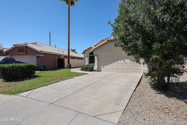 3897 E Douglas Loop, Gilbert, AZ 85234 - view of side of home with concrete driveway, stucco siding, an attached garage, and a tiled roof