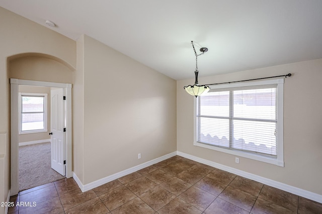 3897 E Douglas Loop, Gilbert, AZ 85234 - tiled spare room featuring baseboards