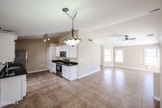3897 E Douglas Loop, Gilbert, AZ 85234 - kitchen with stainless steel appliances, dark countertops, white cabinets, ceiling fan, and light tile patterned floors