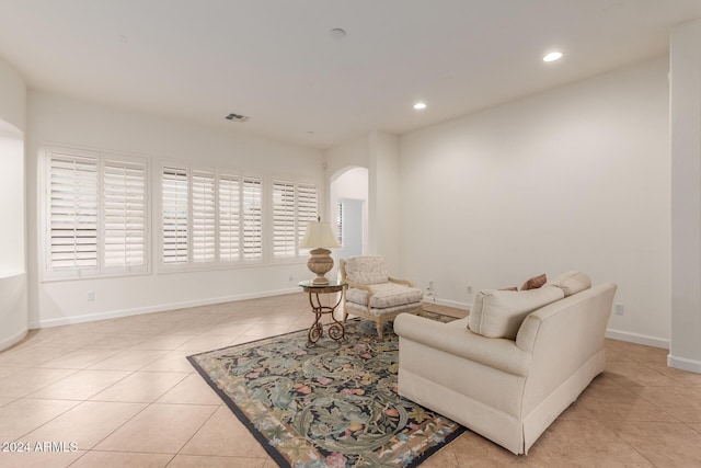 living area with light tile patterned floors