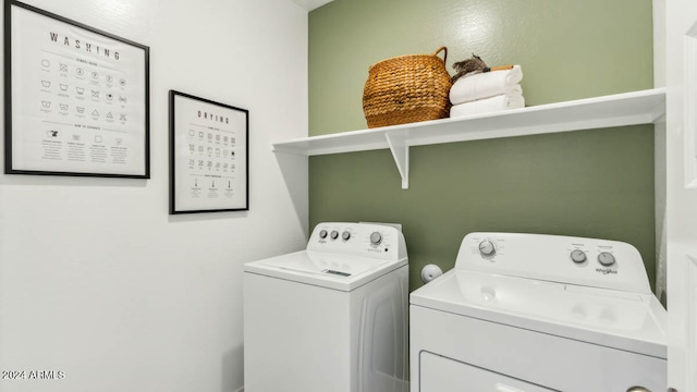 laundry room with washer and dryer