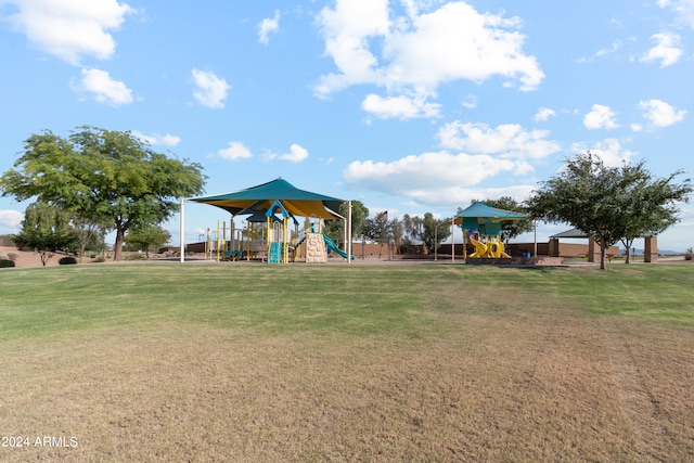 view of jungle gym with a lawn