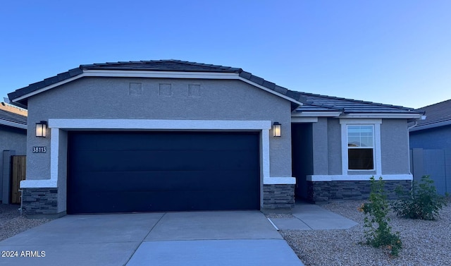 view of front of home with a garage