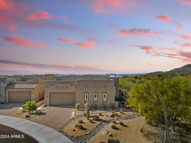 adobe home with a garage