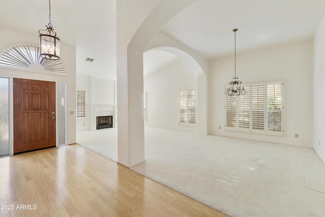 10609 E Cedar Waxwing Dr, Sun Lakes, AZ 85248 - foyer with visible vents, a notable chandelier, and a healthy amount of sunlight