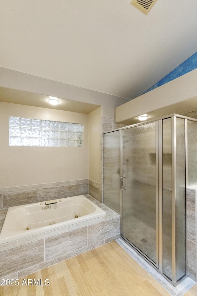 10609 E Cedar Waxwing Dr, Sun Lakes, AZ 85248 - bathroom with visible vents, a stall shower, and a tub with jets