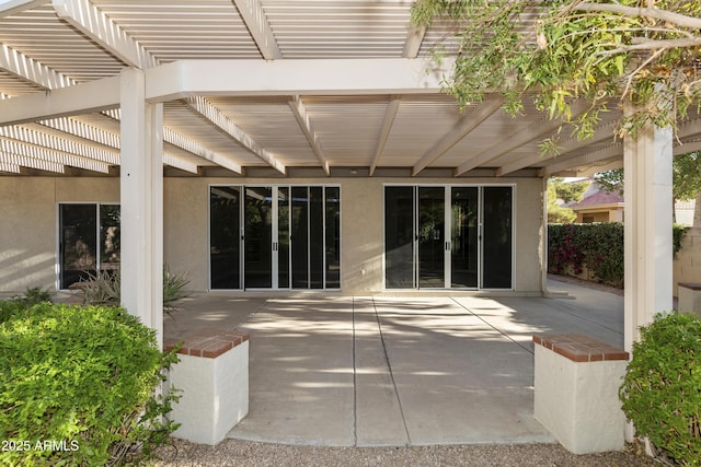 10609 E Cedar Waxwing Dr, Sun Lakes, AZ 85248 - exterior space featuring a pergola, a patio, and stucco siding