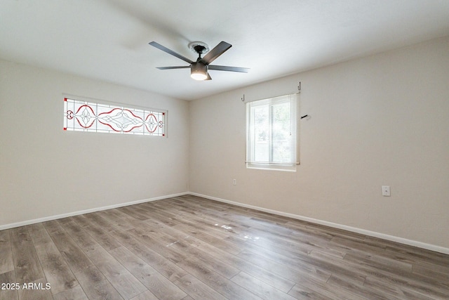 505 W Howe St, Tempe, AZ 85281 - spare room featuring healthy amount of natural light, wood finished floors, and a ceiling fan