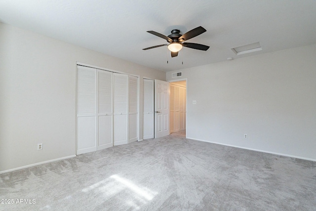505 W Howe St, Tempe, AZ 85281 - unfurnished bedroom featuring attic access, carpet flooring, baseboards, two closets, and a ceiling fan