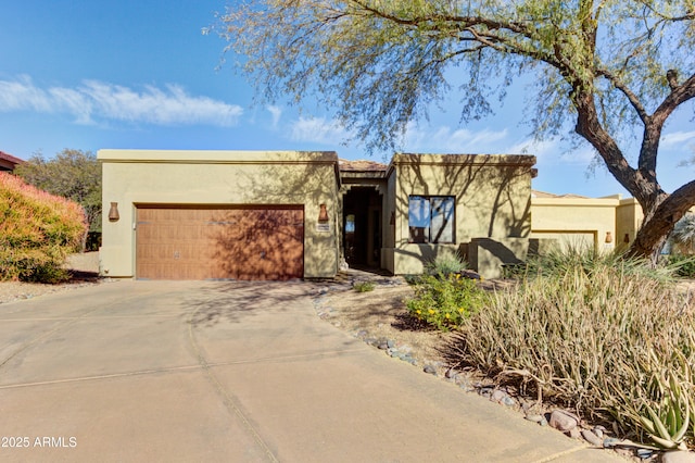 southwest-style home featuring a garage