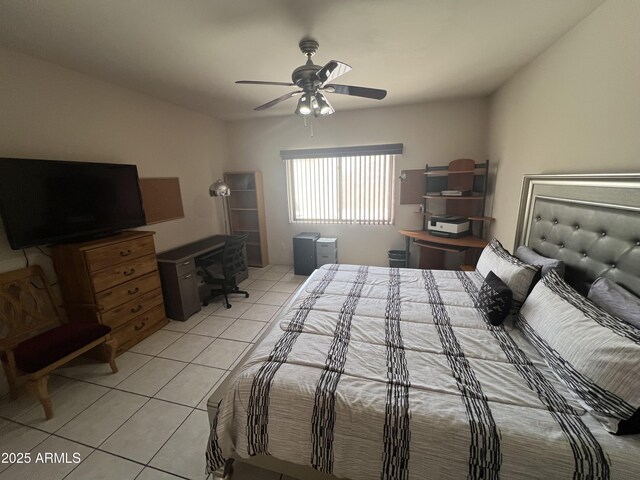 bedroom featuring a ceiling fan and light tile patterned flooring