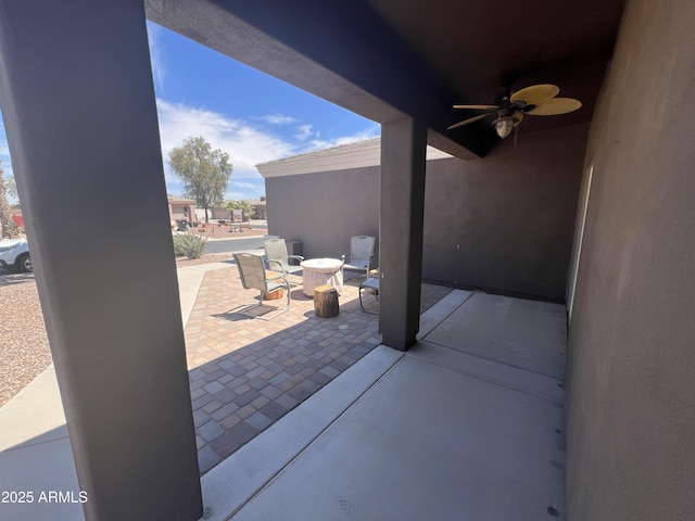 view of patio / terrace featuring a ceiling fan