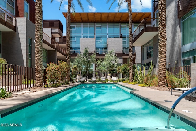 community pool with fence