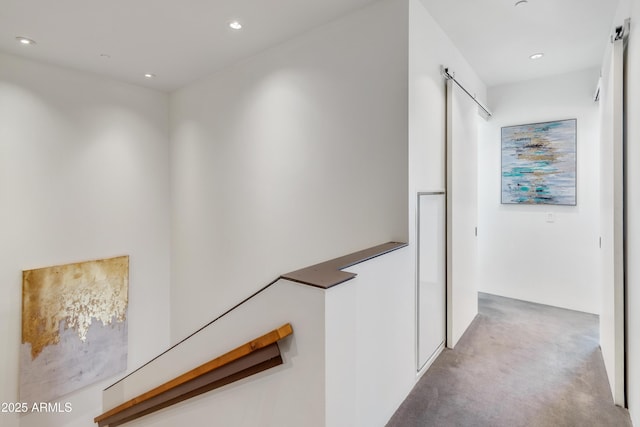 hallway featuring carpet floors and recessed lighting
