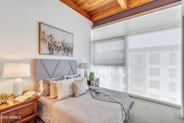 carpeted bedroom featuring wooden ceiling and beamed ceiling