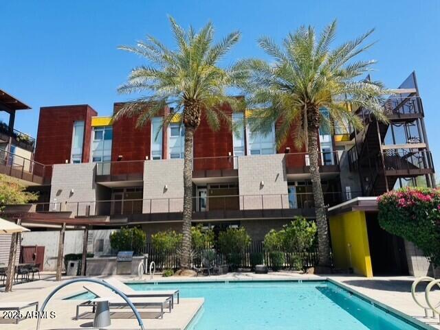 community pool featuring a patio