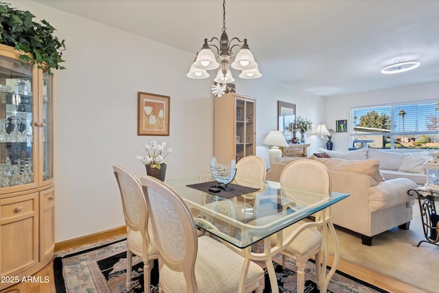 dining room featuring a notable chandelier