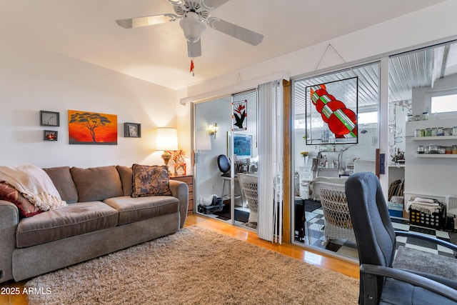 office area with light hardwood / wood-style floors and ceiling fan