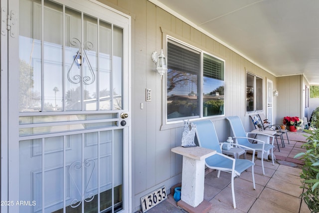 doorway to property with a porch