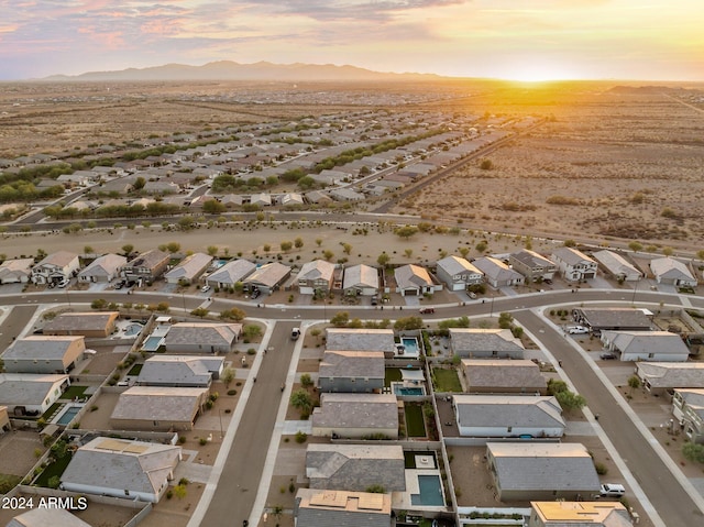 aerial view at dusk with a mountain view