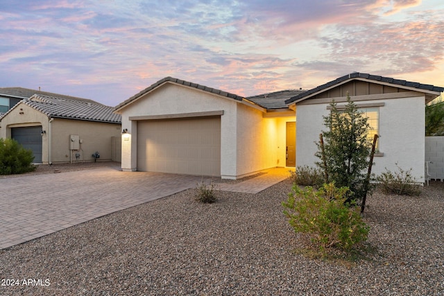 view of front of home with a garage