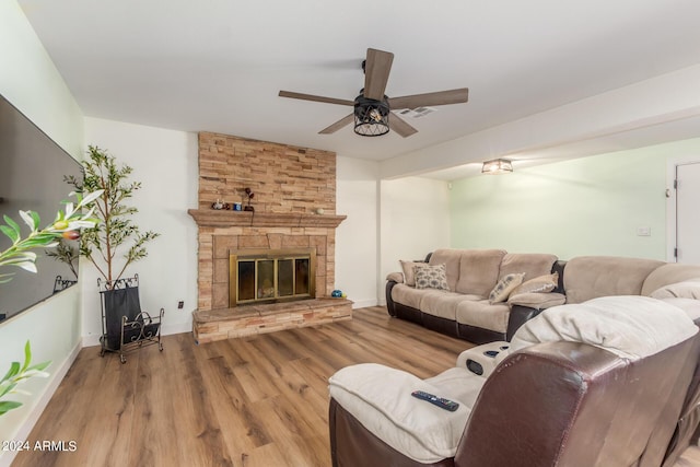 3136 W Sunnyside Ave, Phoenix, AZ 85029 - living room with hardwood / wood-style flooring, ceiling fan, and a fireplace
