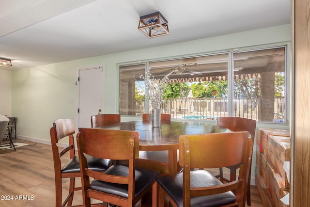 3136 W Sunnyside Ave, Phoenix, AZ 85029 - dining space with wood-type flooring and ceiling fan