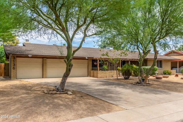 3136 W Sunnyside Ave, Phoenix, AZ 85029 - ranch-style house featuring a garage